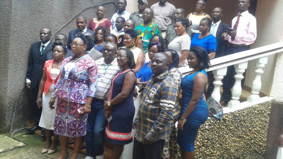 Participants pose for a family photo after the Kumba workshop