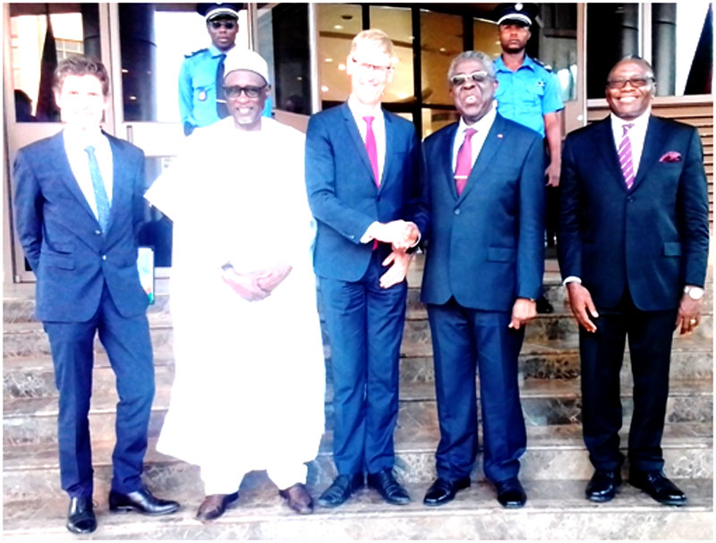 Belgian Special Envoy, Jozeh Smets in handshake with Peter Mafany Musonge