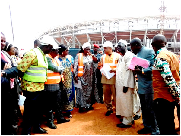 Minister Ketcha Courtes giving instructions in front of Paul Biya modern stadium