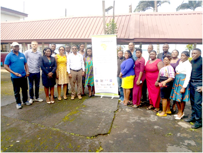 Organisers pose with participants