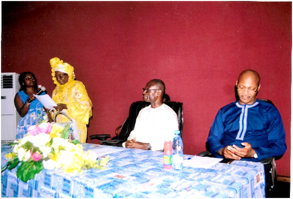 Mme Djeilani (standing) delivering speech in the presence of the CNPS DG (middle)