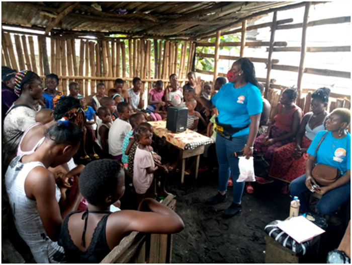 CEO of ‘Hope for a better tomorrow’, Eli-Anne Tembeng, talking to women and girls during campaign